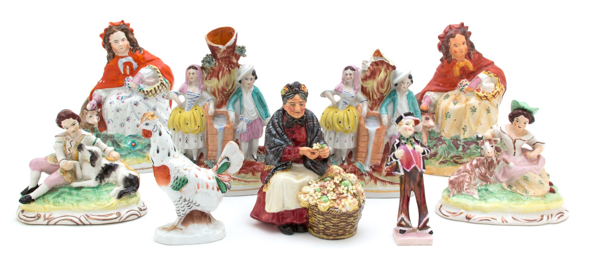 A Group of Nine English Porcelain Figures Height of tallest 8 inches. — 20TH CENTURY