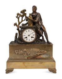 An Empire Style Gilt and Patinated Bronze Figural Mantel Clock