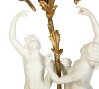 A Gilt Bronze Mounted Bisque Porcelain Candelabrum