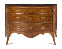 An Italian Gilt Bronze Mounted Serpentine Walnut Commode