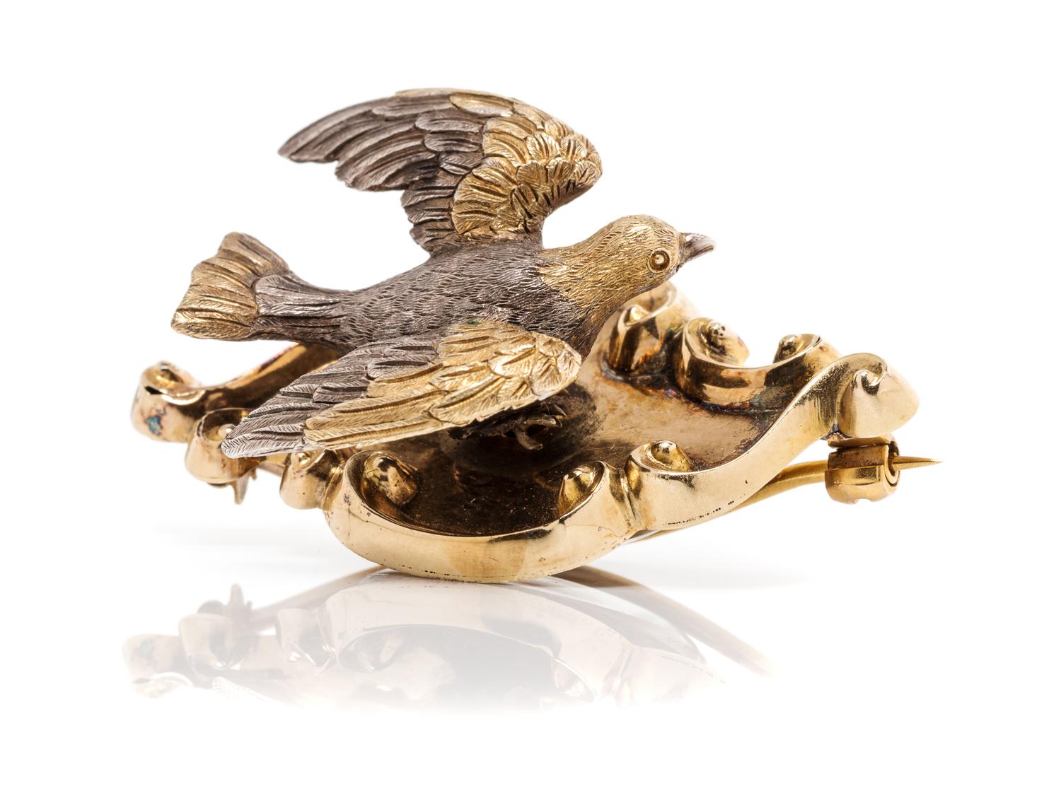 A Victorian Yellow Gold and Silver En Tremblant Bird Motif Mourning Brooch, 8.00 dwts.