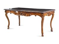 A French Provincial Carved Walnut Marble-Top Center Table