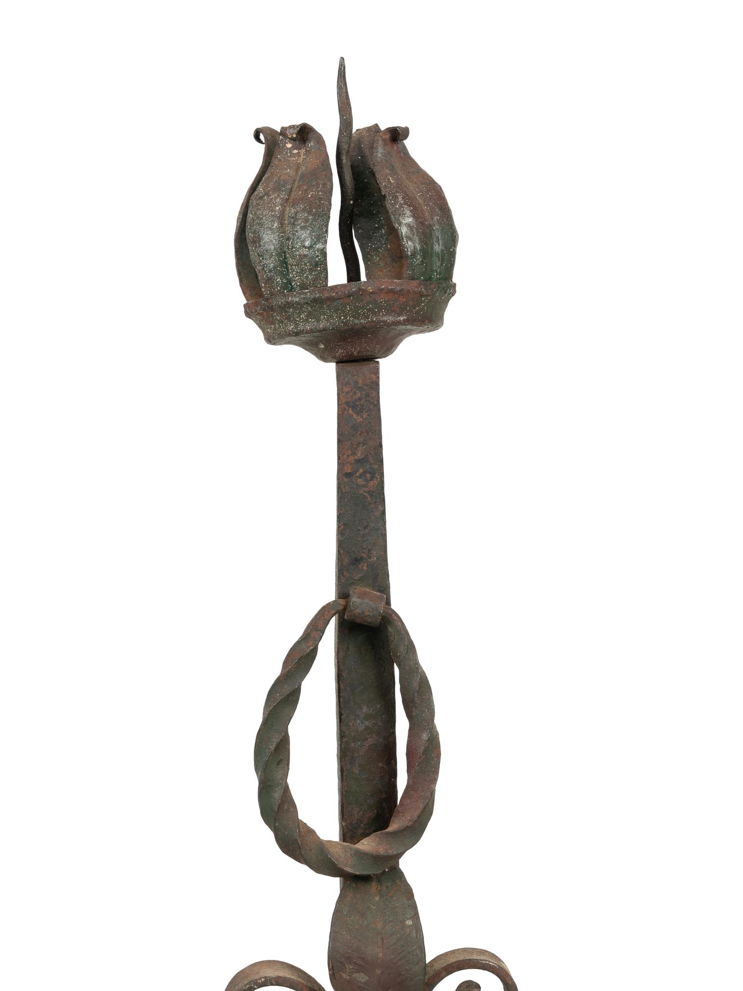 A Pair of Continental Iron Andirons