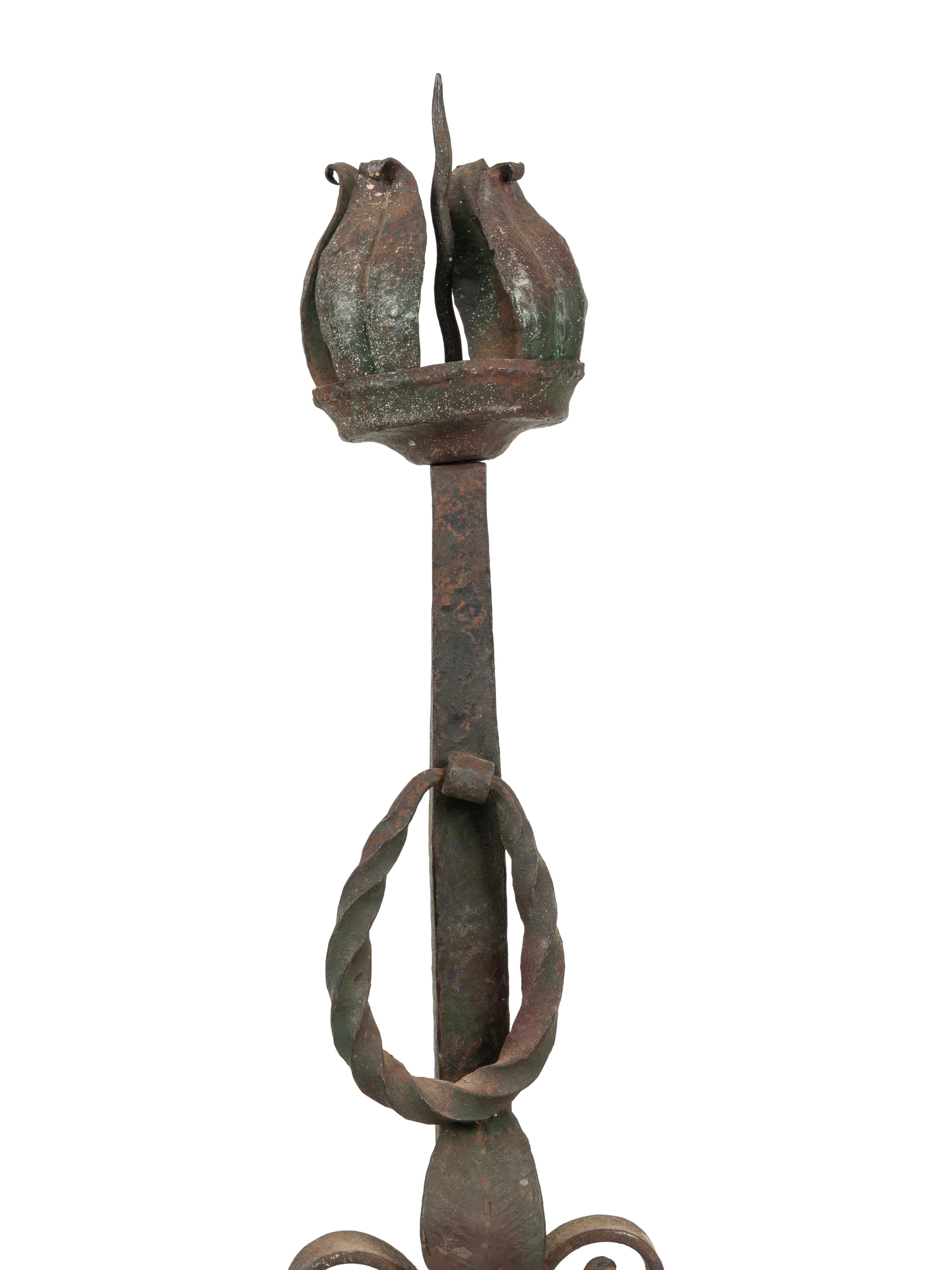 A Pair of Continental Iron Andirons