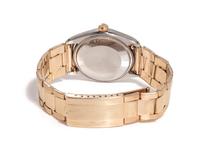 ROLEX, REF. 1002 STAINLESS STEEL AND YELLOW GOLD 'OYSTER PERPETUAL' WATCH