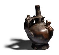 A Sican Blackware Stirrup Vessel