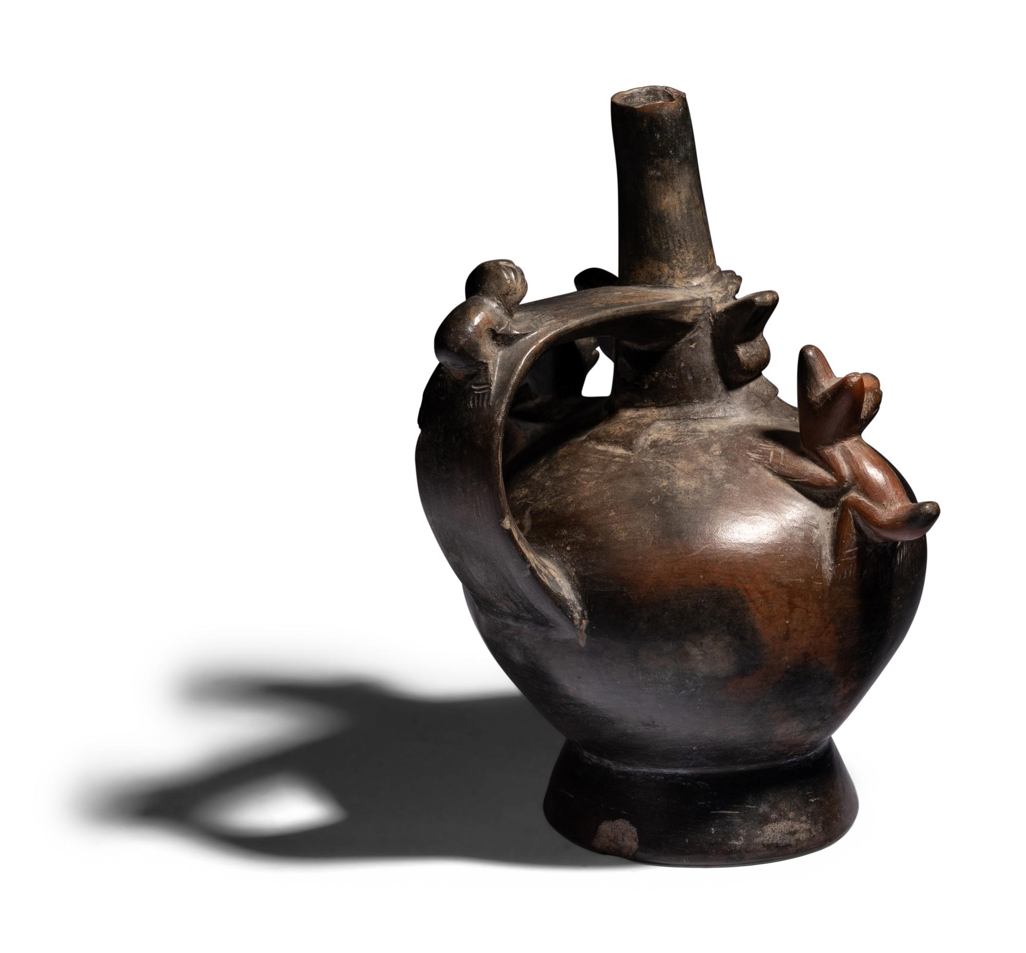 A Sican Blackware Stirrup Vessel