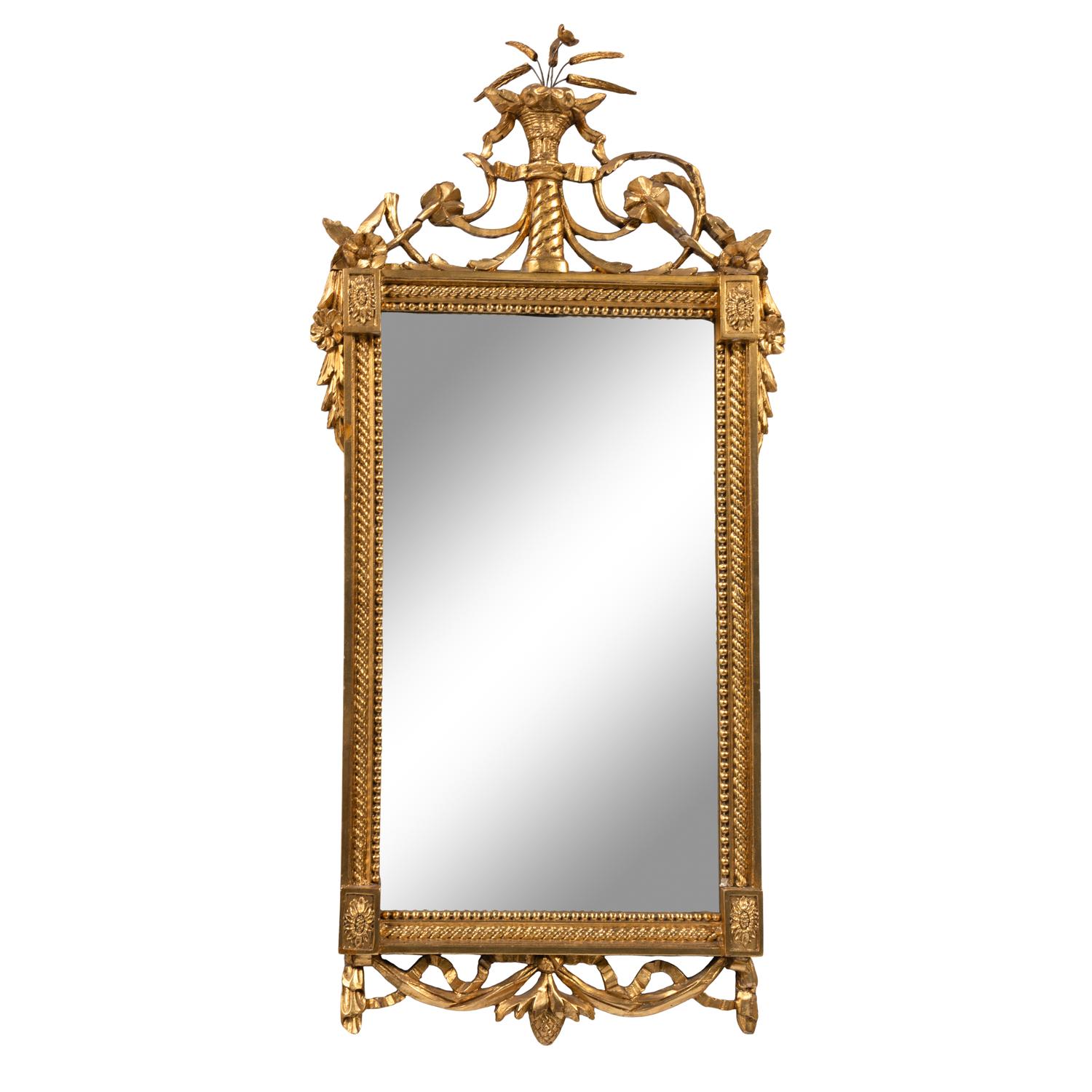 A Regency Style Carved Giltwood Mirror
