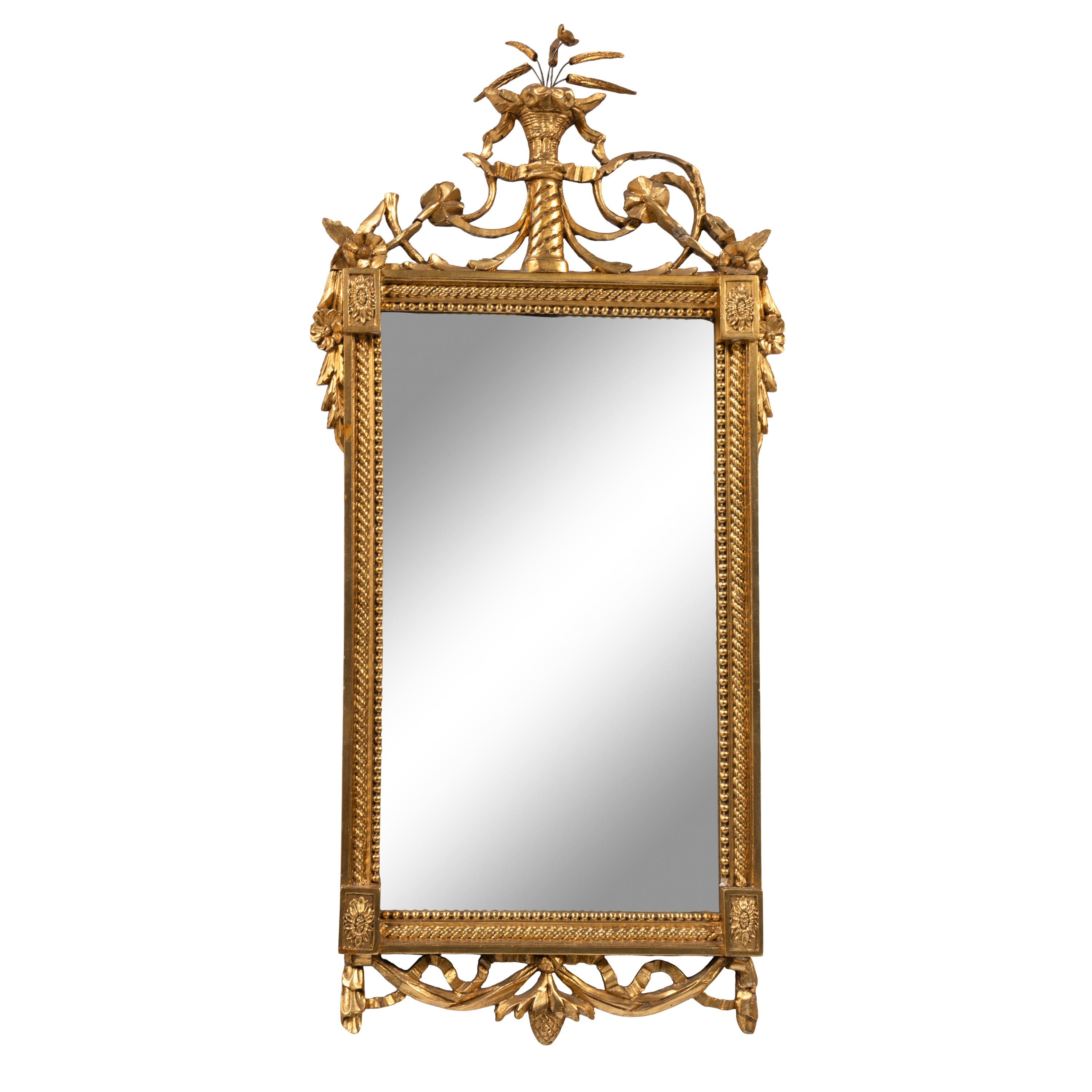 A Regency Style Carved Giltwood Mirror