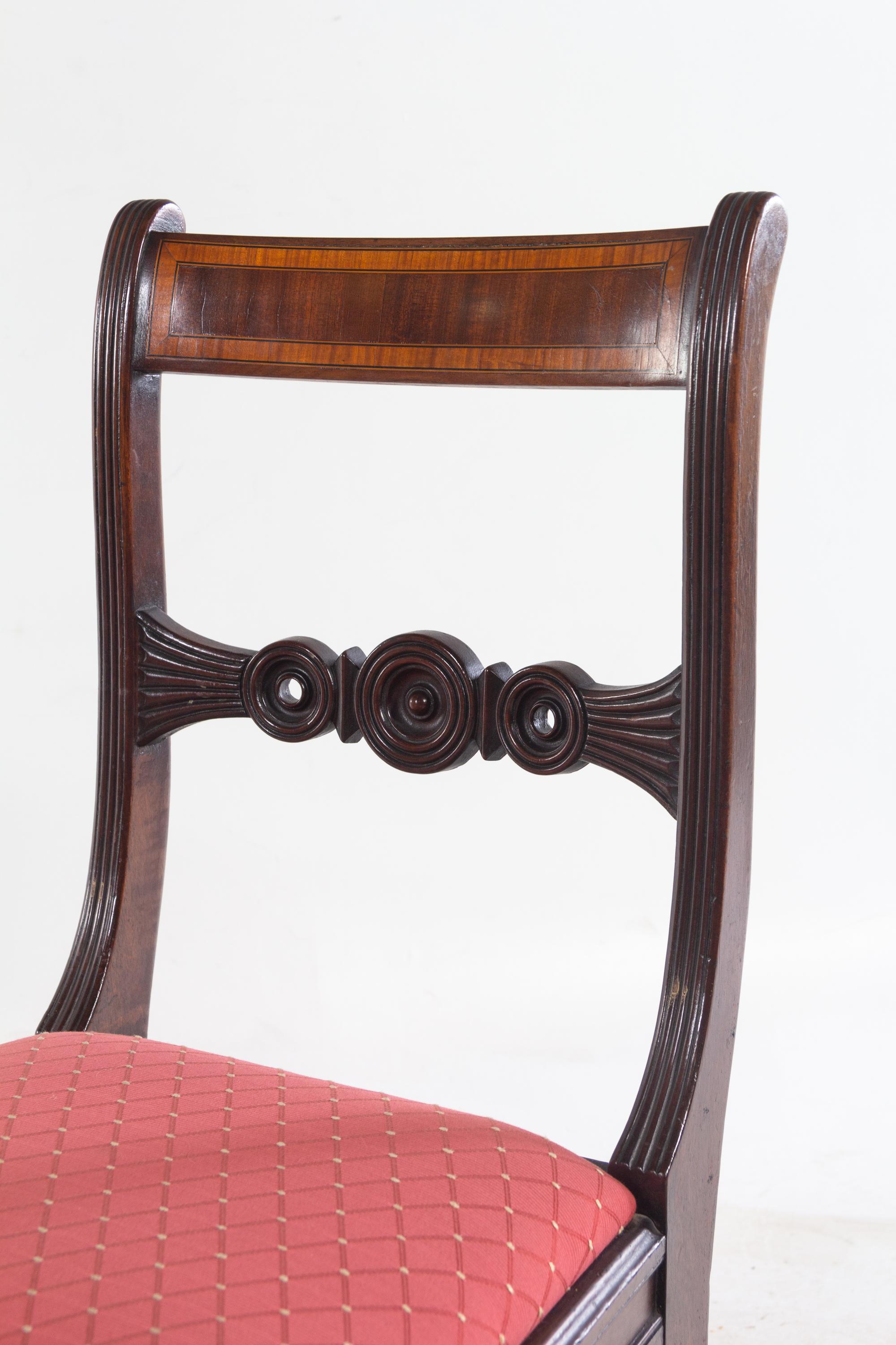 A Set of Eight Regency Style Mahogany and Satinwood Dining Chairs
