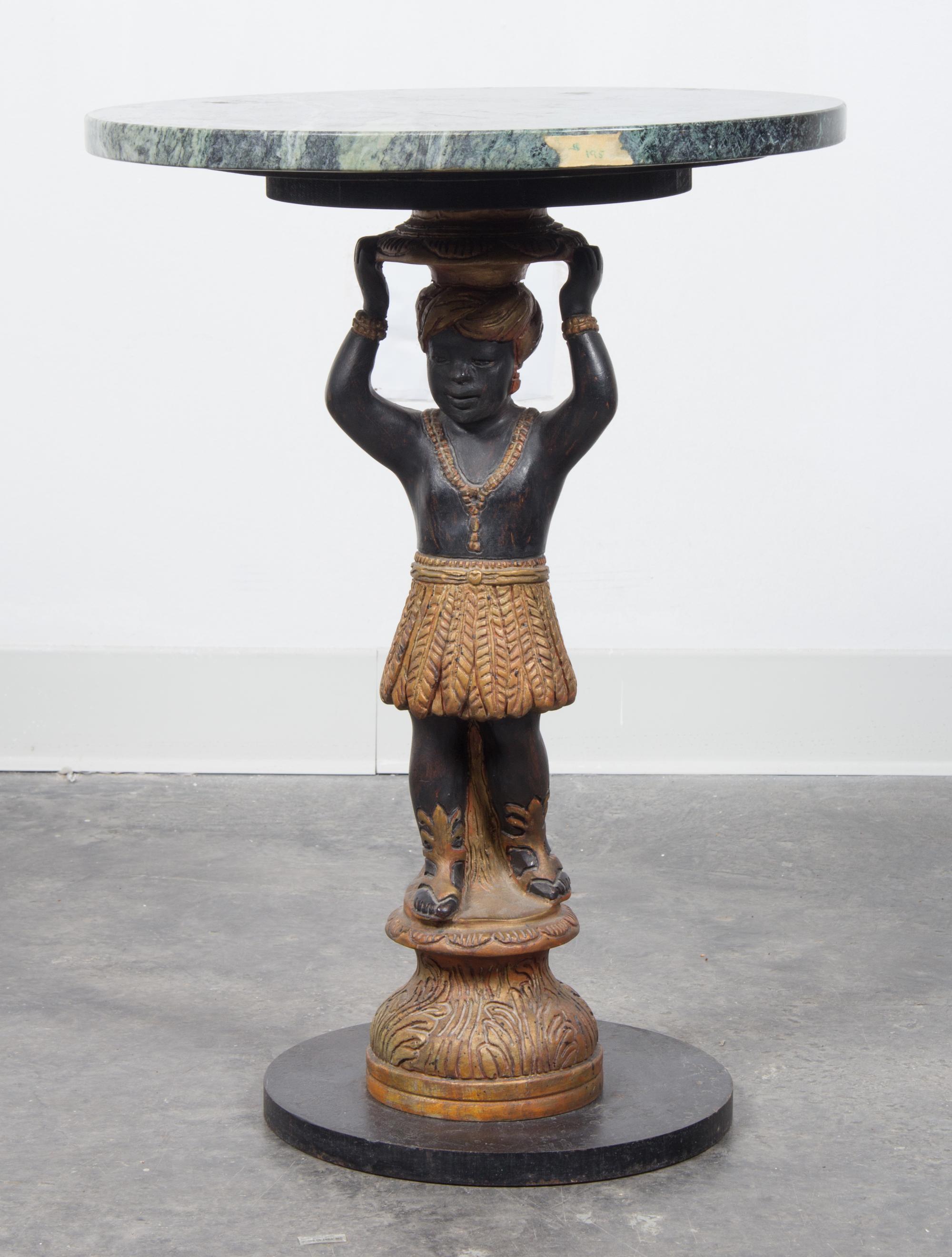 A Victorian Gilt and Black Lacquer Figural Pedestal Table Height 22 1/2 inches.