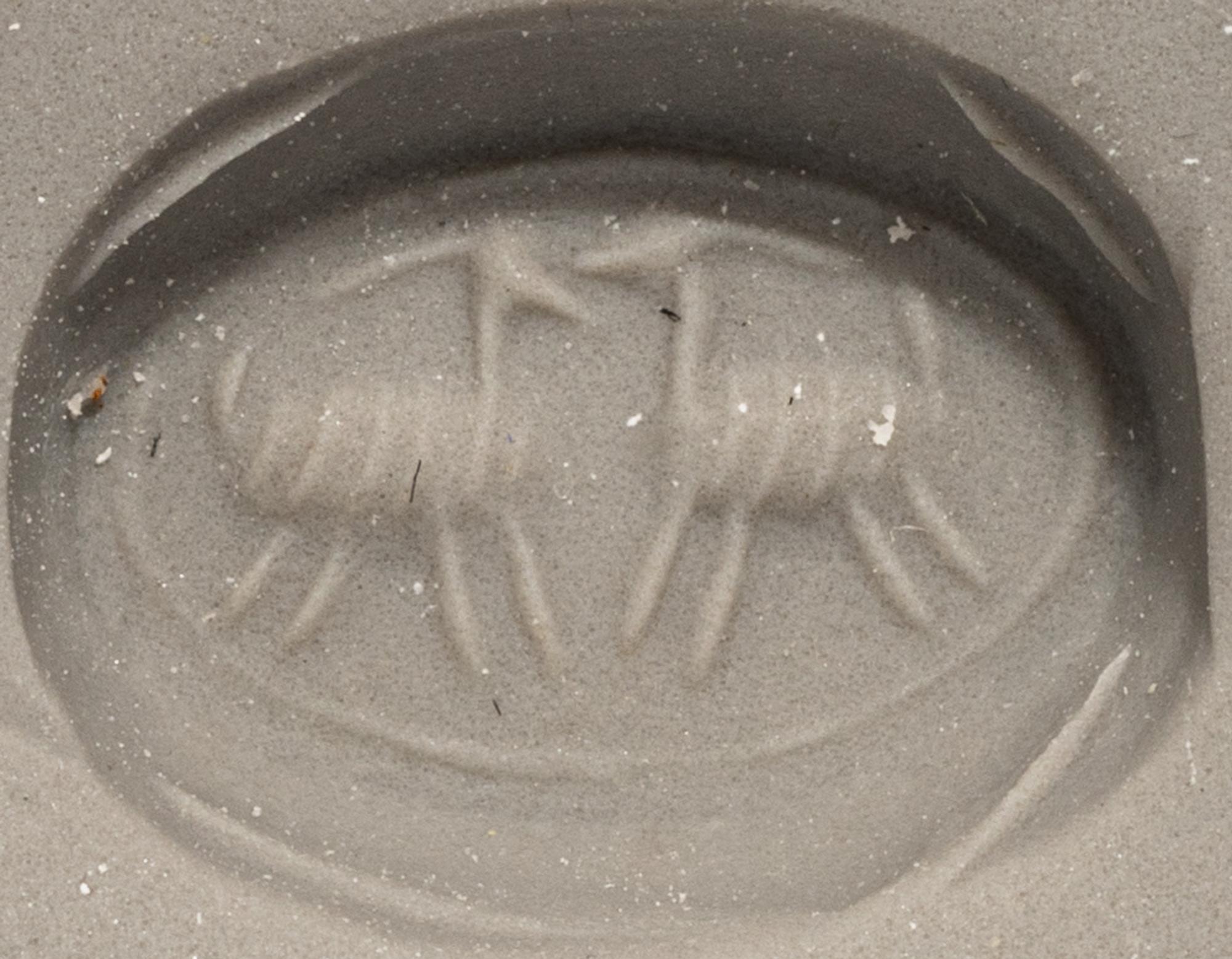 A Phoenician Hematite Scarab with Two Ibexes