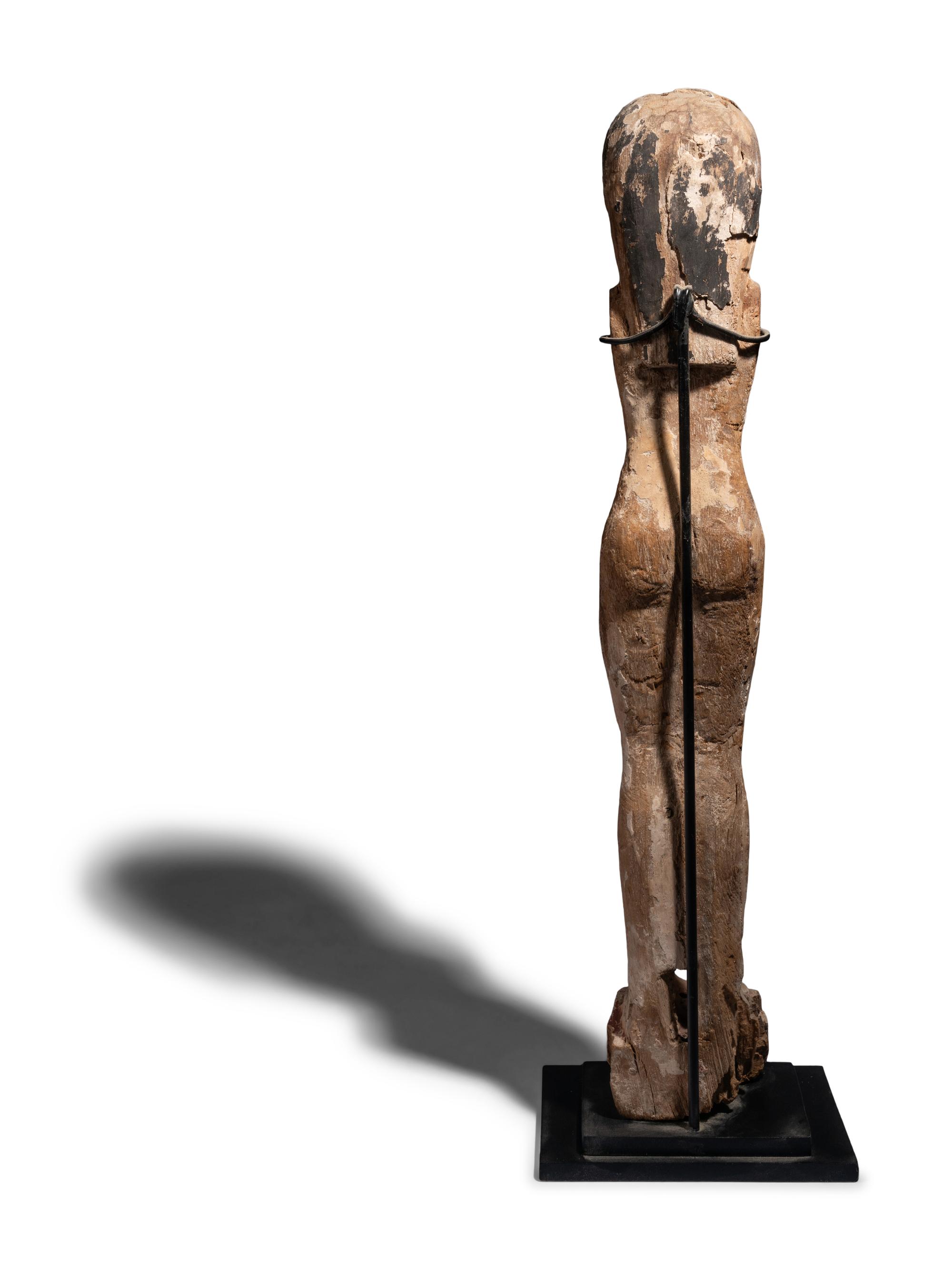 An Egyptian Wood Female Figure