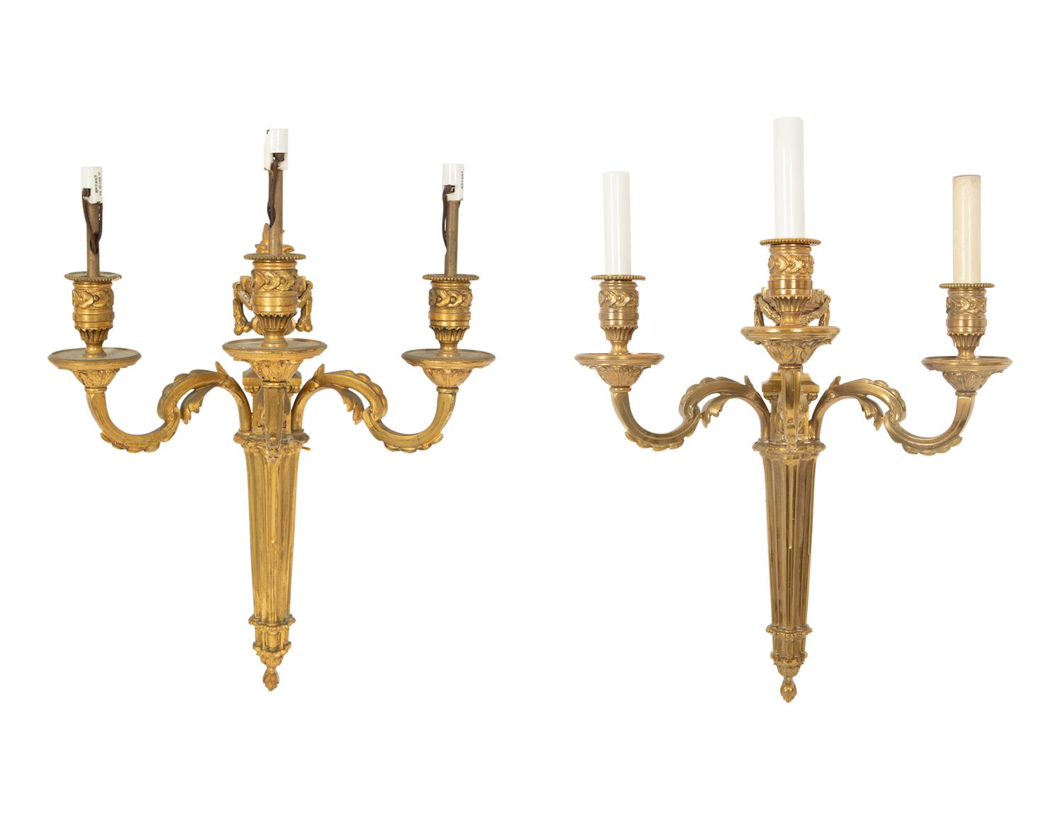 A Pair of Louis XVI Style Gilt Bronze Three-Light Wall Sconces
