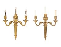 A Pair of Louis XVI Style Gilt Bronze Three-Light Wall Sconces
