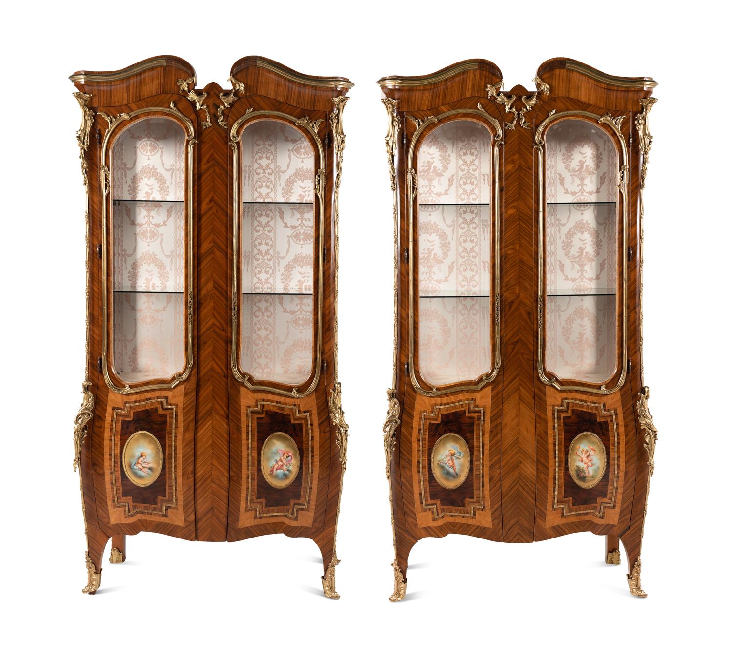 A Pair of Louis XV Style Gilt Bronze Mounted Tulipwood Vitrine Cabinets