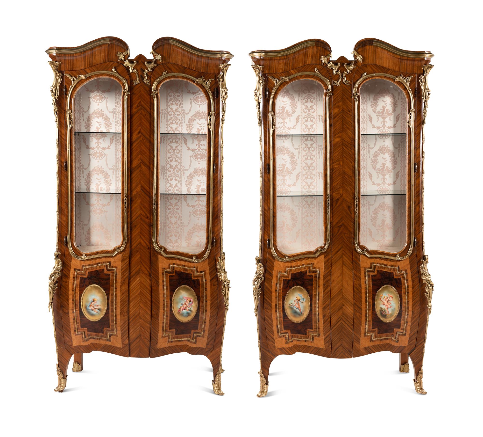 A Pair of Louis XV Style Gilt Bronze Mounted Tulipwood Vitrine Cabinets