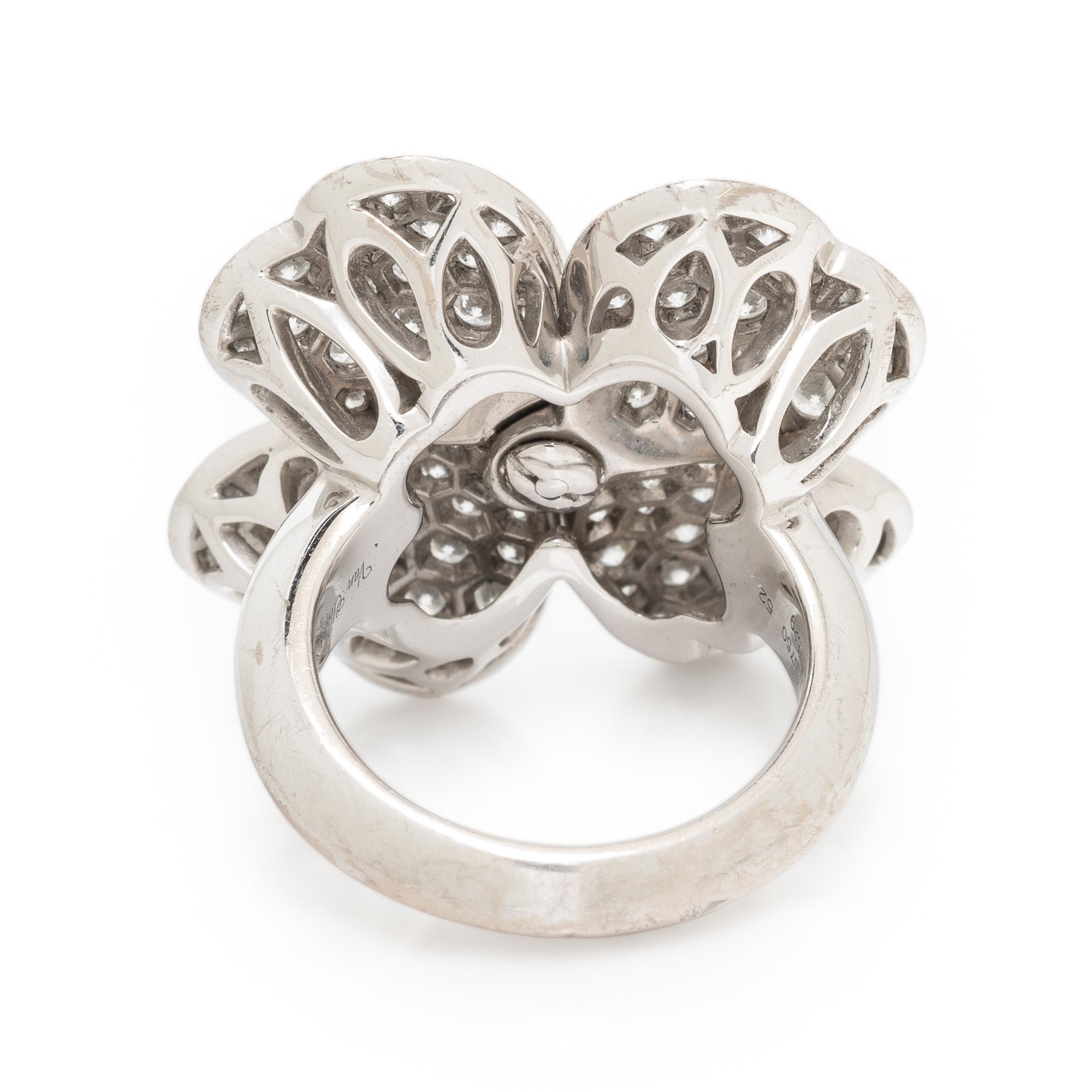 VAN CLEEF & ARPELS, DIAMOND AND WHITE GOLD 'COSMOS' RING