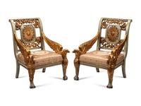 A Pair of Italian Neoclassical Style Painted and Parcel Gilt Eagle-Motif Armchairs