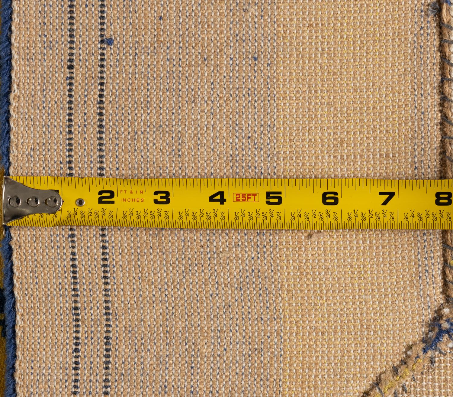 A Modern Blue and Yellow Wool Rug