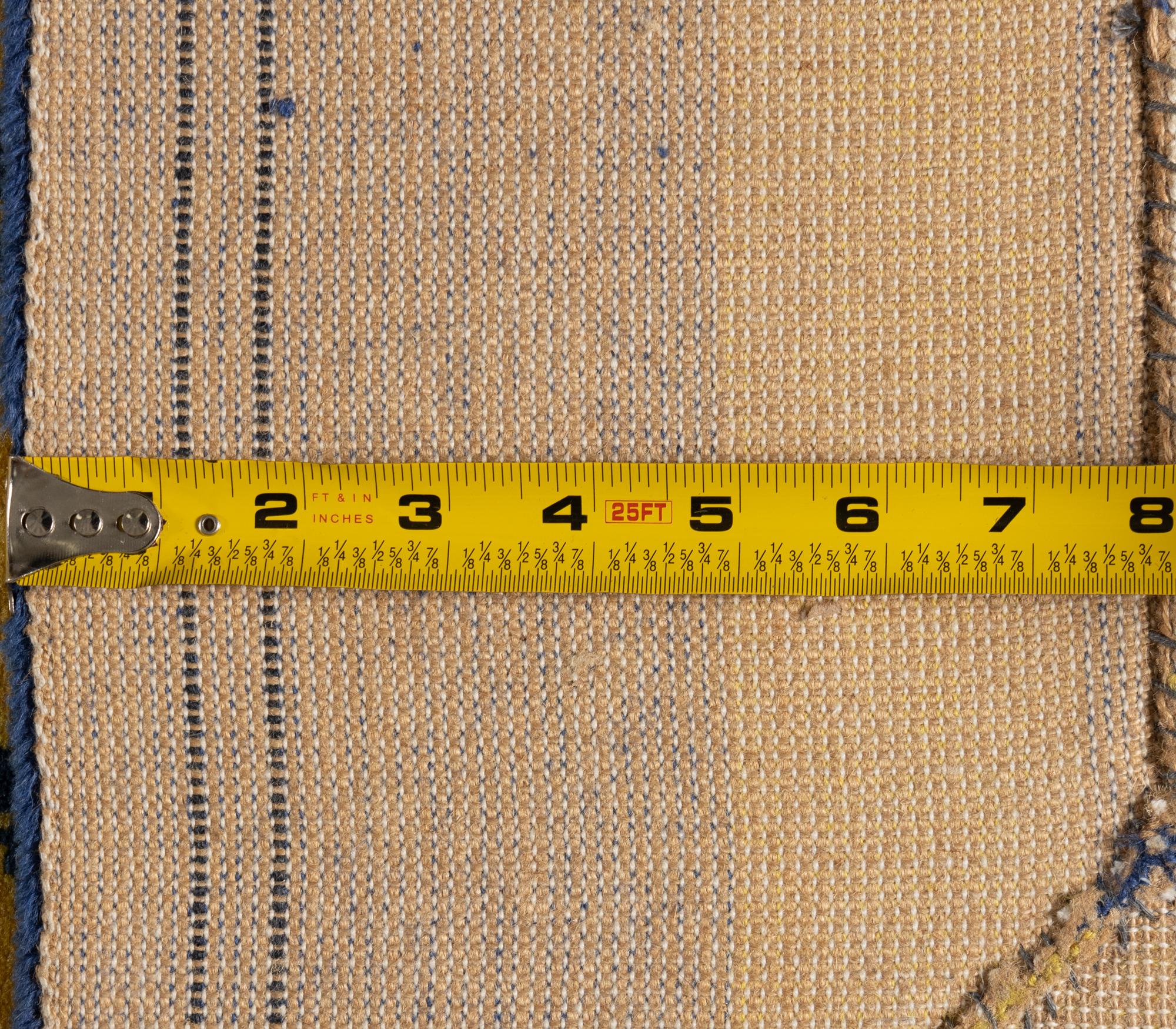 A Modern Blue and Yellow Wool Rug