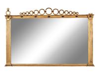 A Continental Giltwood and Parcel Ebonized Overmantel Mirror