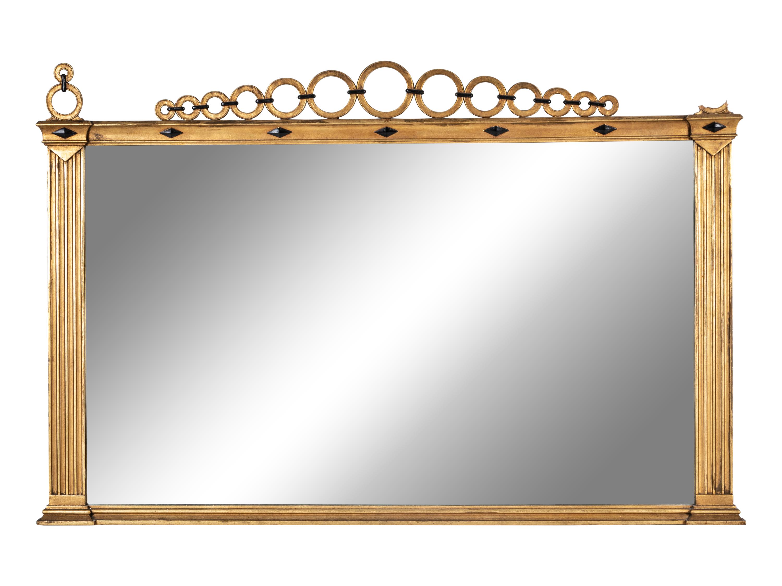 A Continental Giltwood and Parcel Ebonized Overmantel Mirror