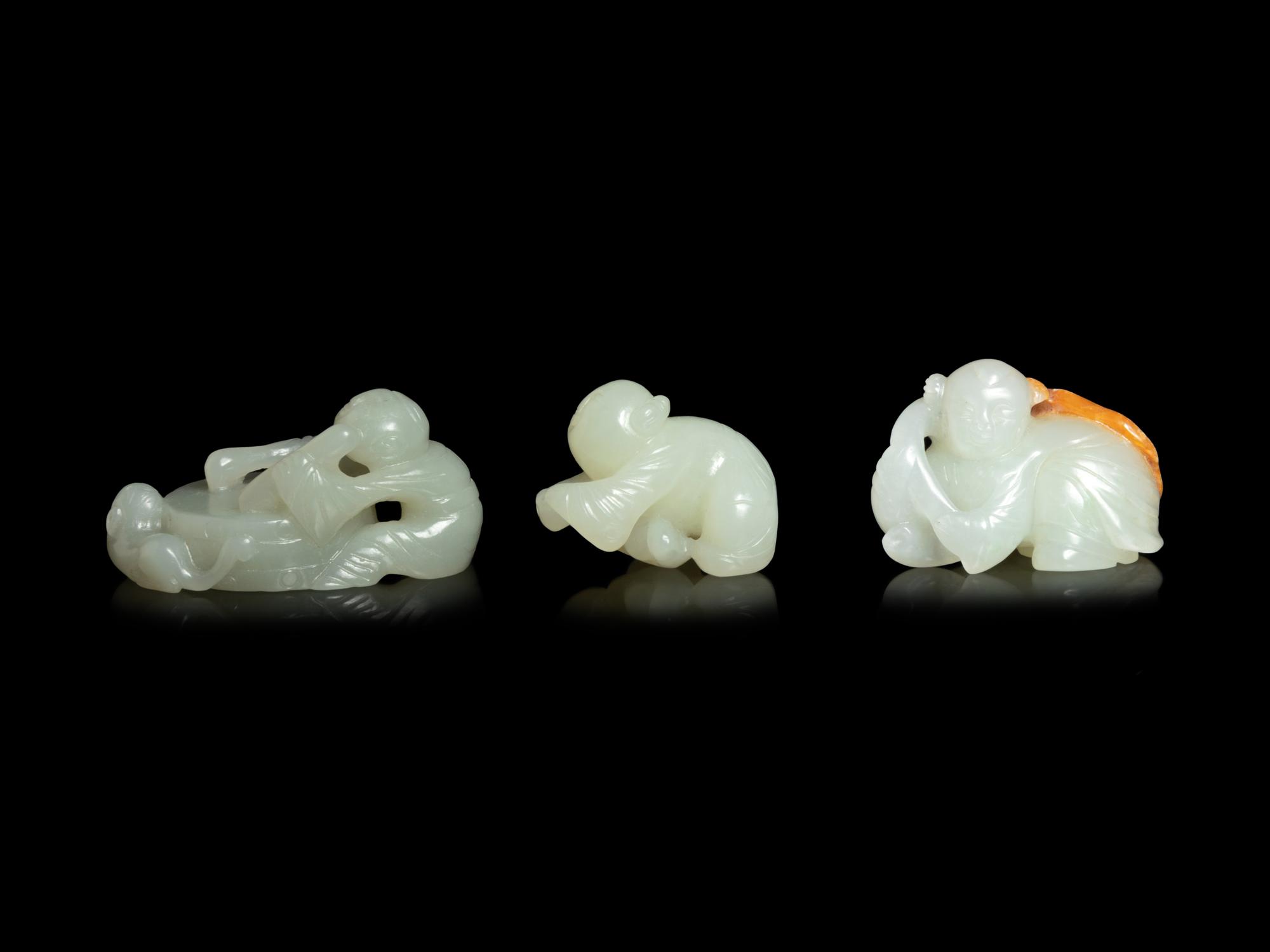 Three Chinese Jade Figures of Boys