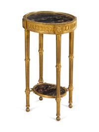 A Louis XVI Style Gilt Bronze and Marble-Inset Table
