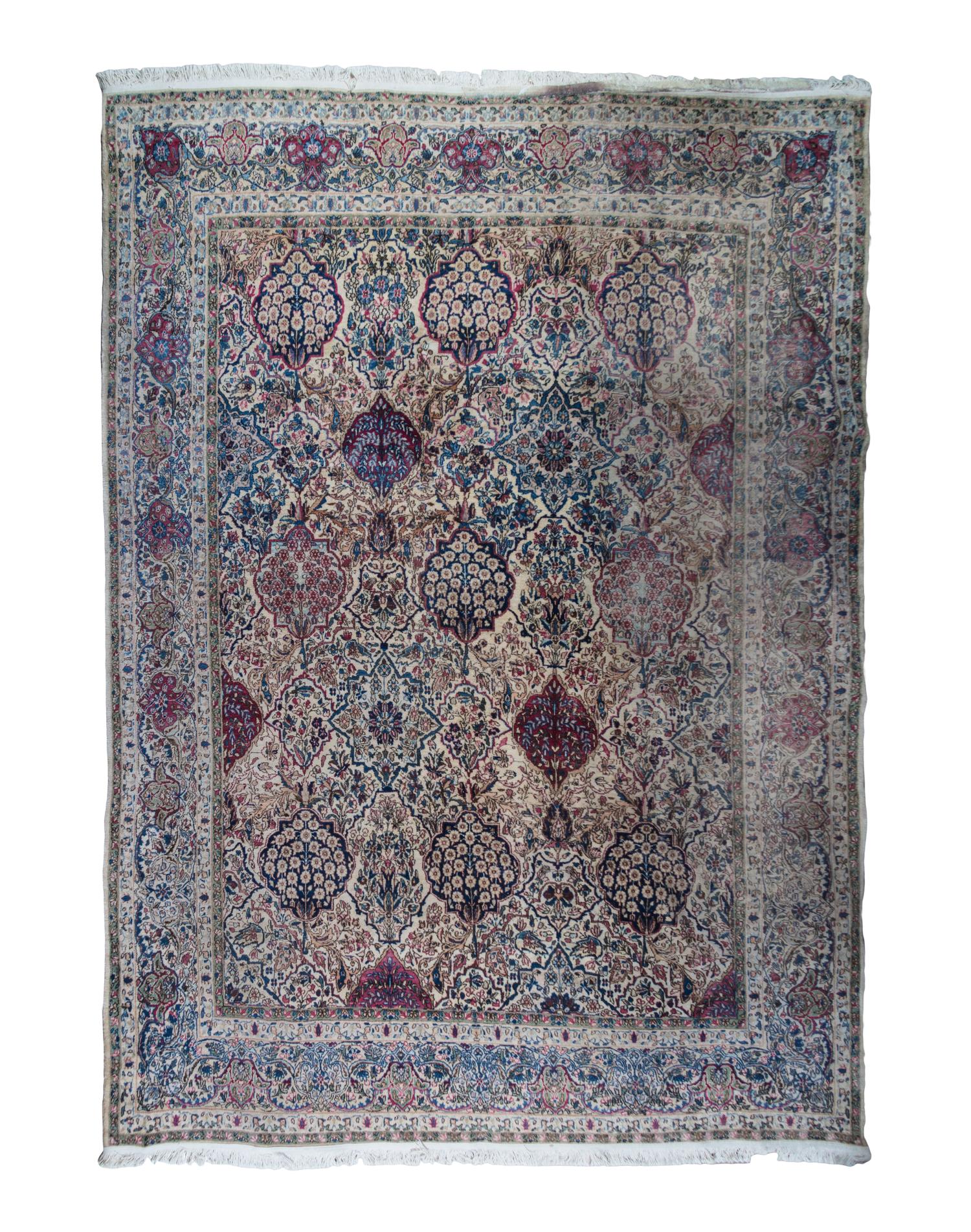 A Kirman Wool Rug 11 feet x 8 feet 7 inches.