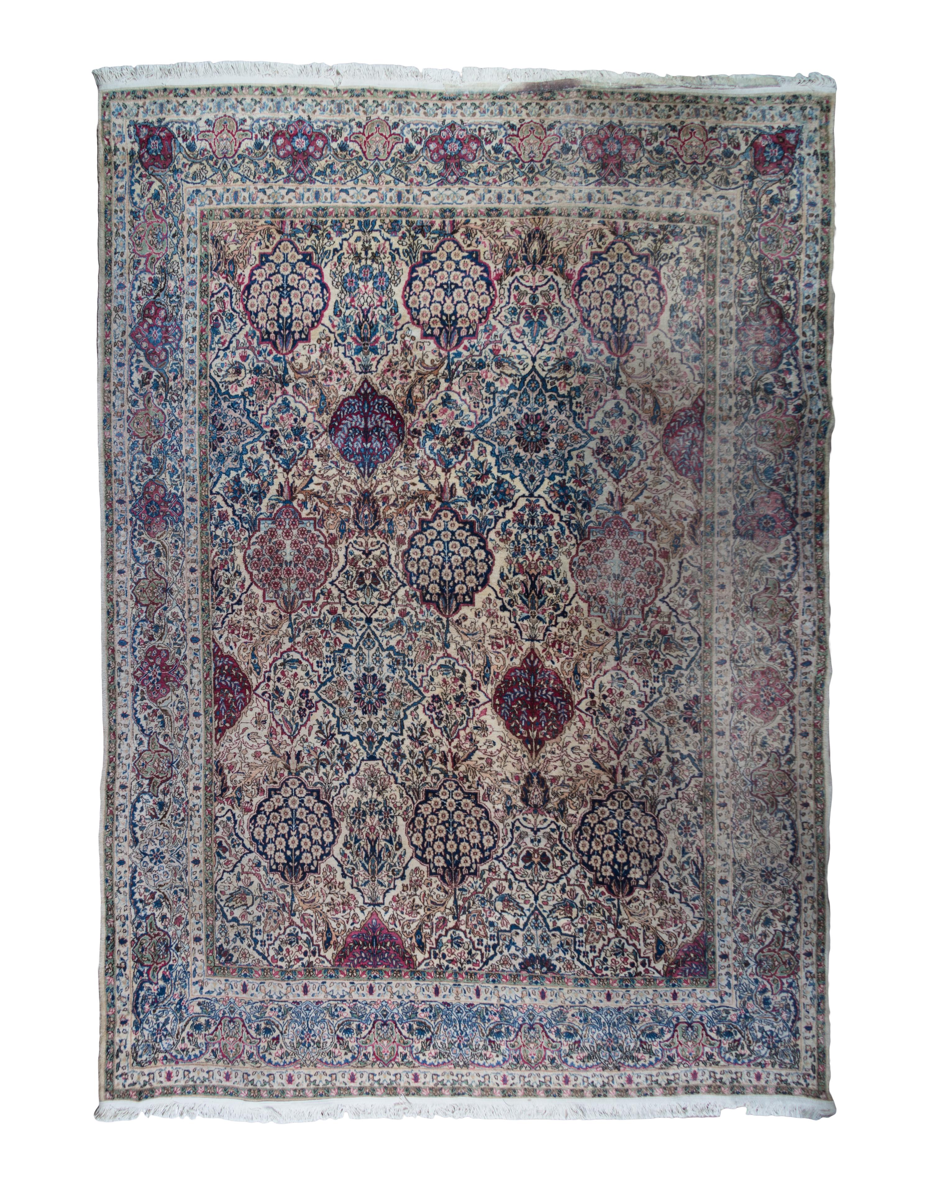 A Kirman Wool Rug 11 feet x 8 feet 7 inches.