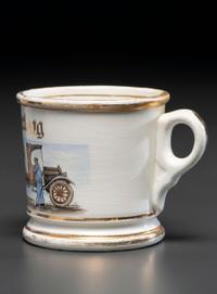 A Porcelain Occupational Shaving Mug Depicting a Dump Truck