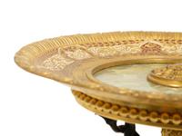 An Empire Style Patinated and Gilt Bronze Mounted Onyx Centerpiece