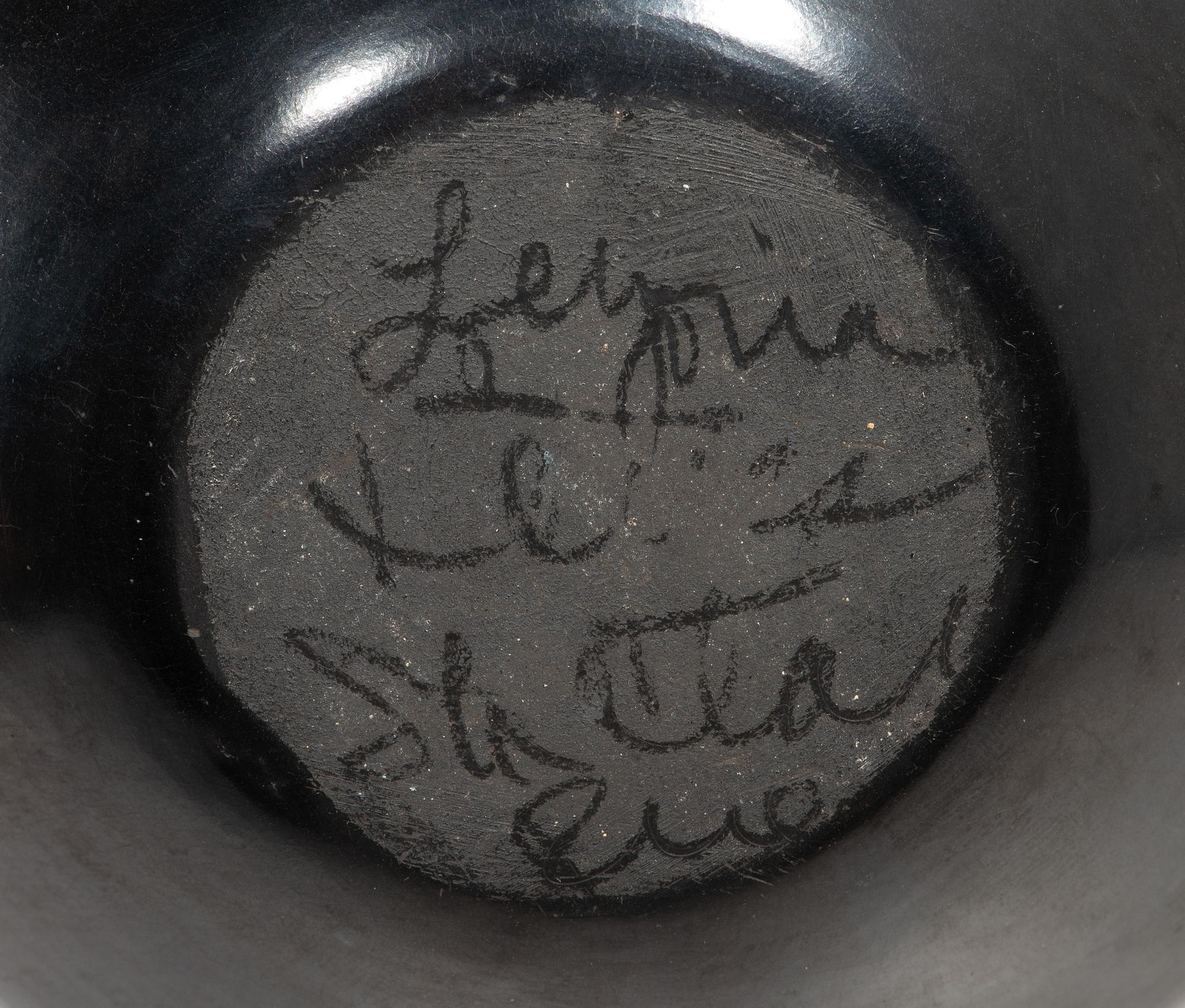 Santa Clara and San Ildefonso Pottery