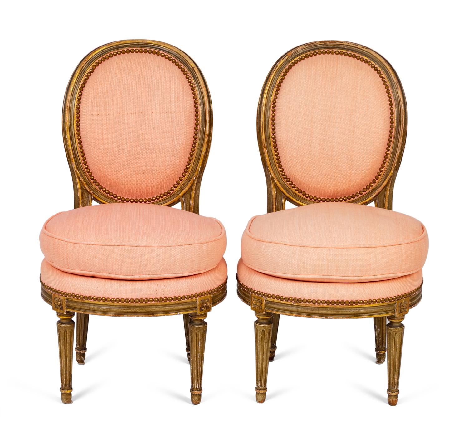 A Pair of Louis XVI Parcel-Gilt Petite Boudoir Chairs — 19TH CENTURY