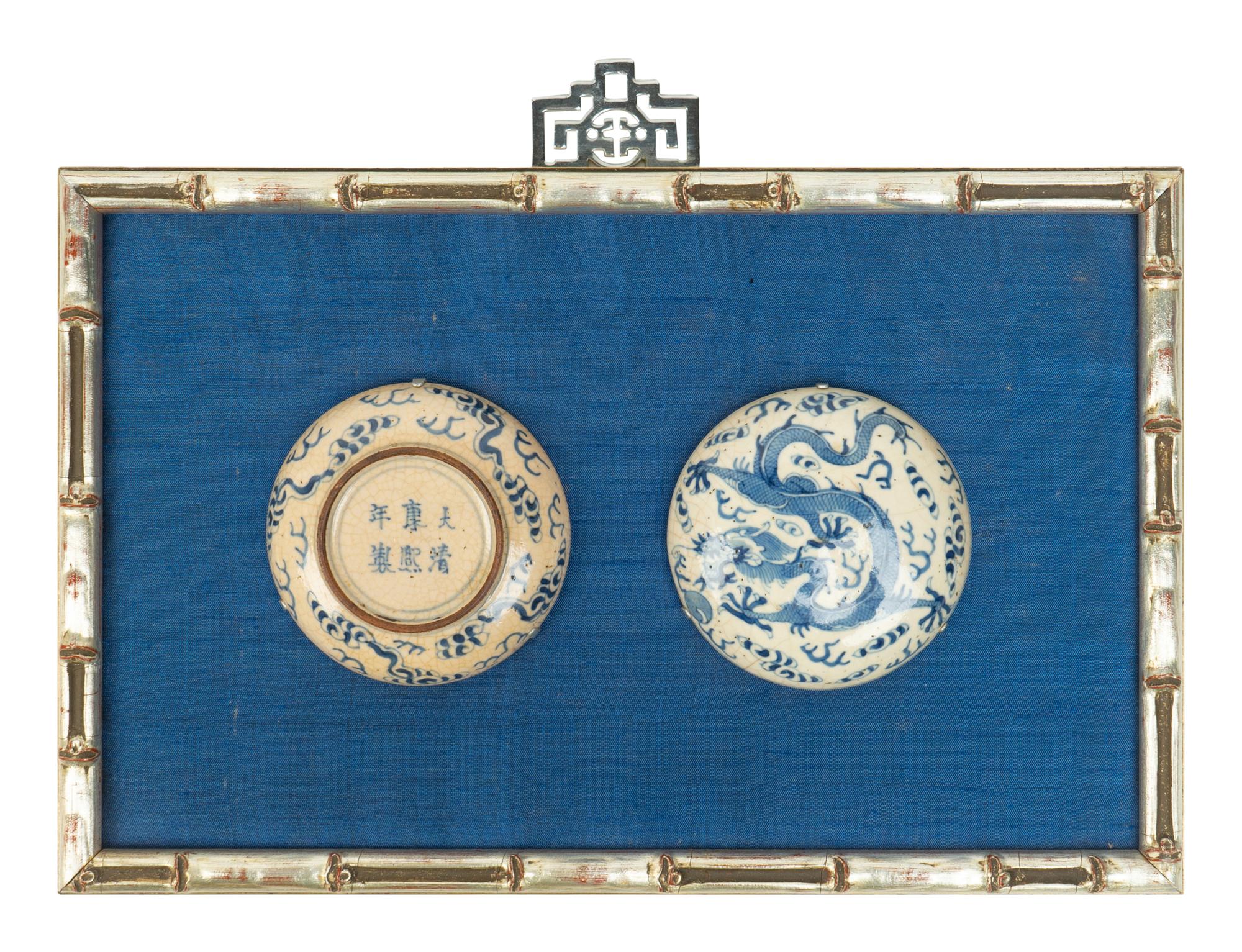 Two pieces of Chinese Carved Laquer Wall Hangings and a Framed Blue and White Porcelain Cup — 20TH CENTURY