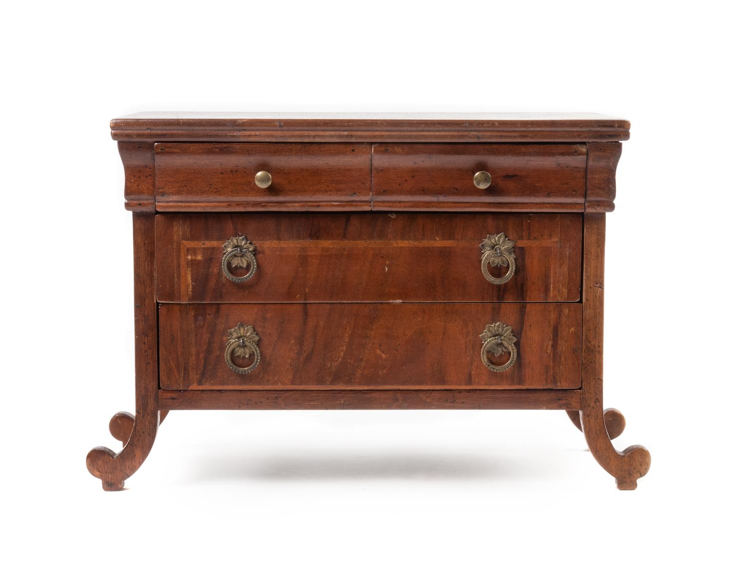 An Italian Walnut Diminutive Chest