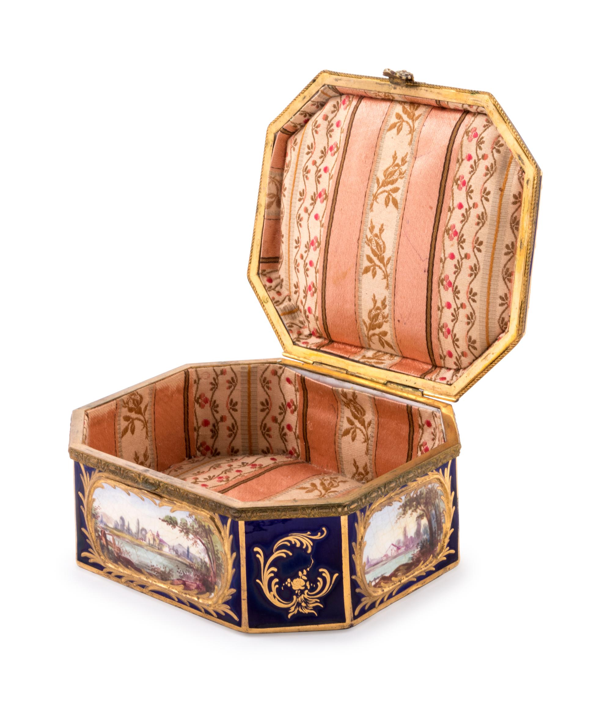 A Sèvres Style Gilt Metal Mounted, Painted and Parcel Gilt Porcelain Table Casket