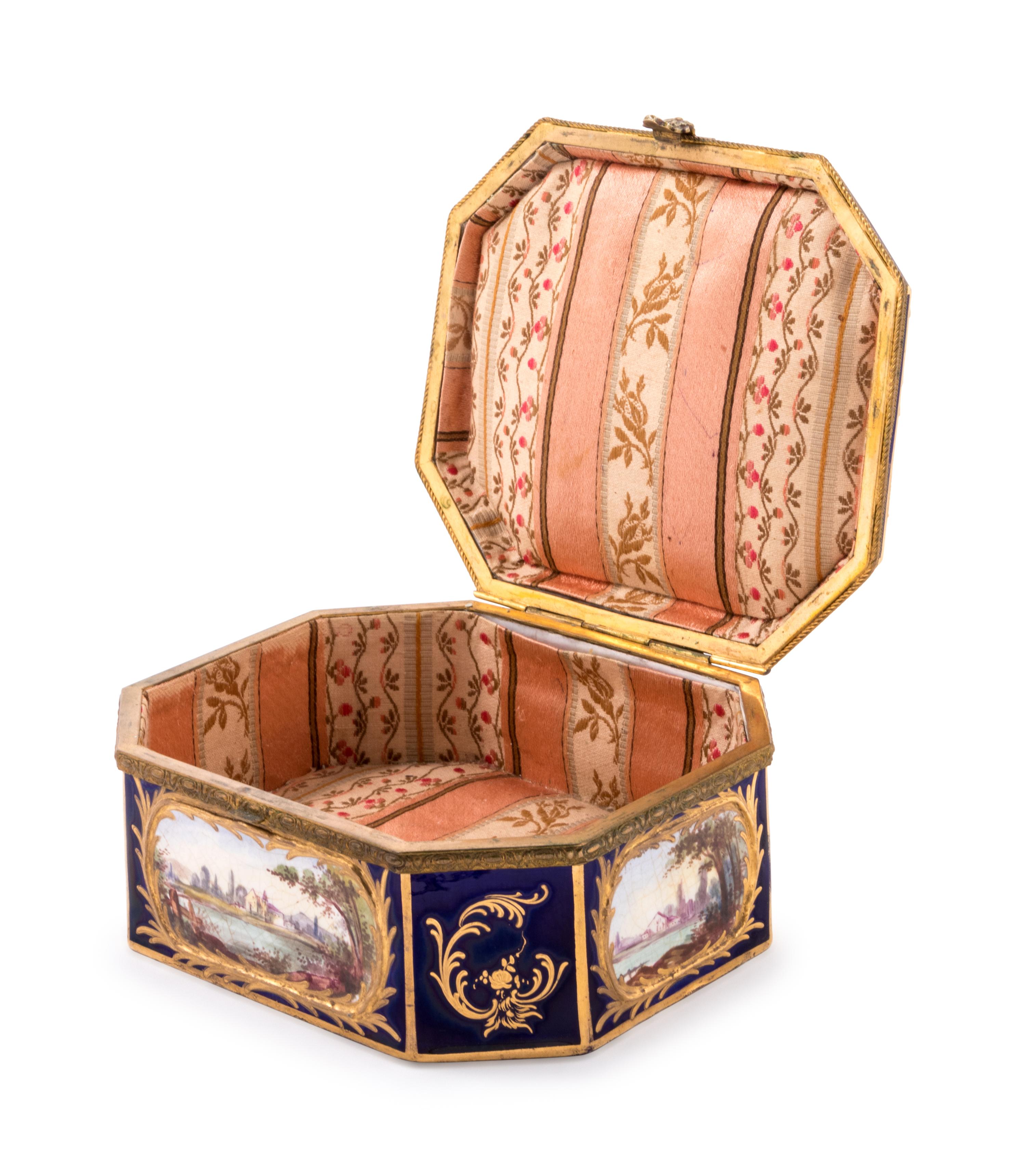 A Sèvres Style Gilt Metal Mounted, Painted and Parcel Gilt Porcelain Table Casket