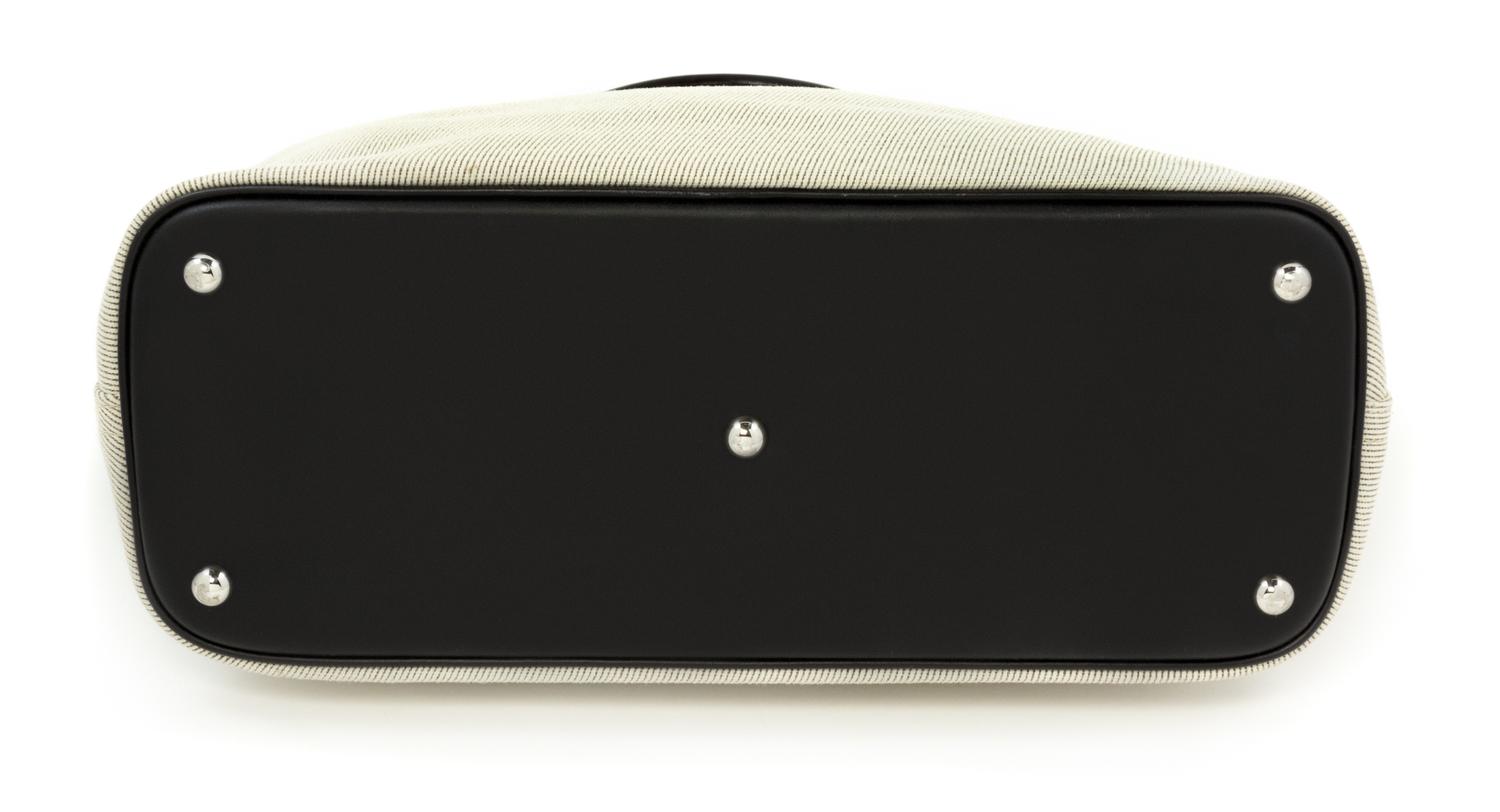 An Hermès Bolide "Paddock" 35cm Canvas Bag, 14" x 12.5" x 6"; Handle drop: 4.5".