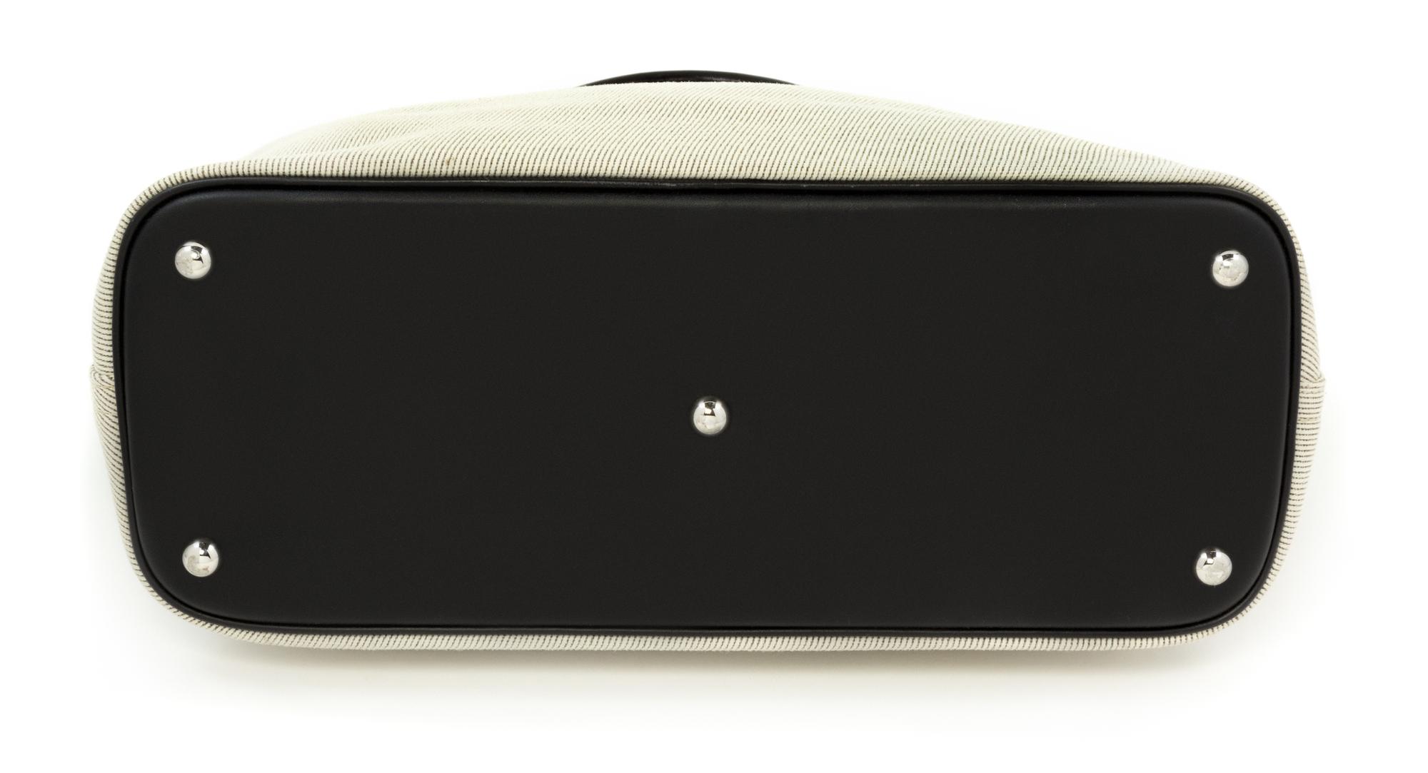An Hermès Bolide "Paddock" 35cm Canvas Bag, 14" x 12.5" x 6"; Handle drop: 4.5".