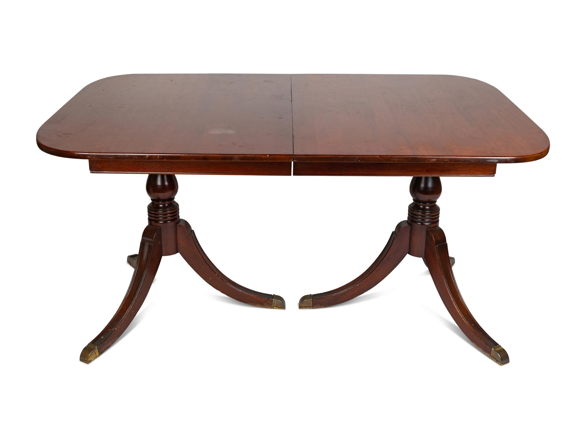 A Regency Style Mahogany Double-Pedestal Dining Table