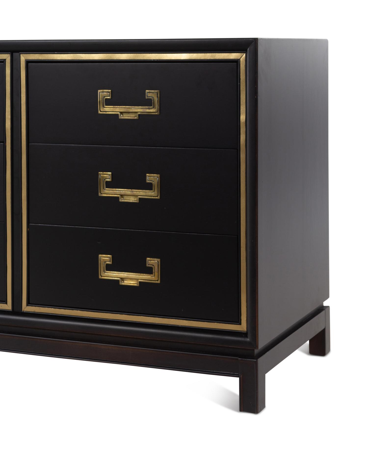 A Contemporary "Hollywood Regency" Style Brass Mounted Ebonized Chest of Drawers