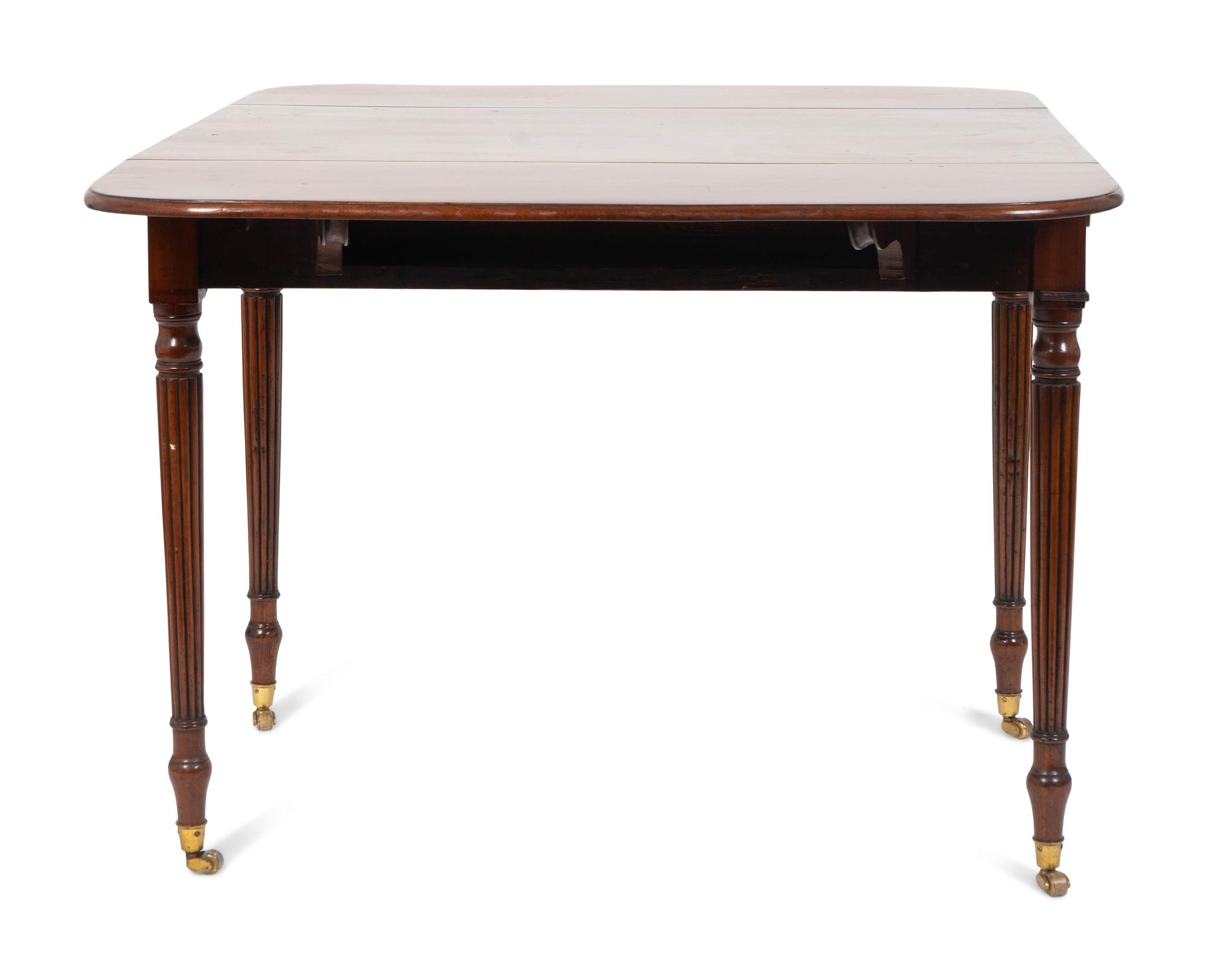 A Regency Mahogany Drop Leaf Table — 19TH CENTURY
