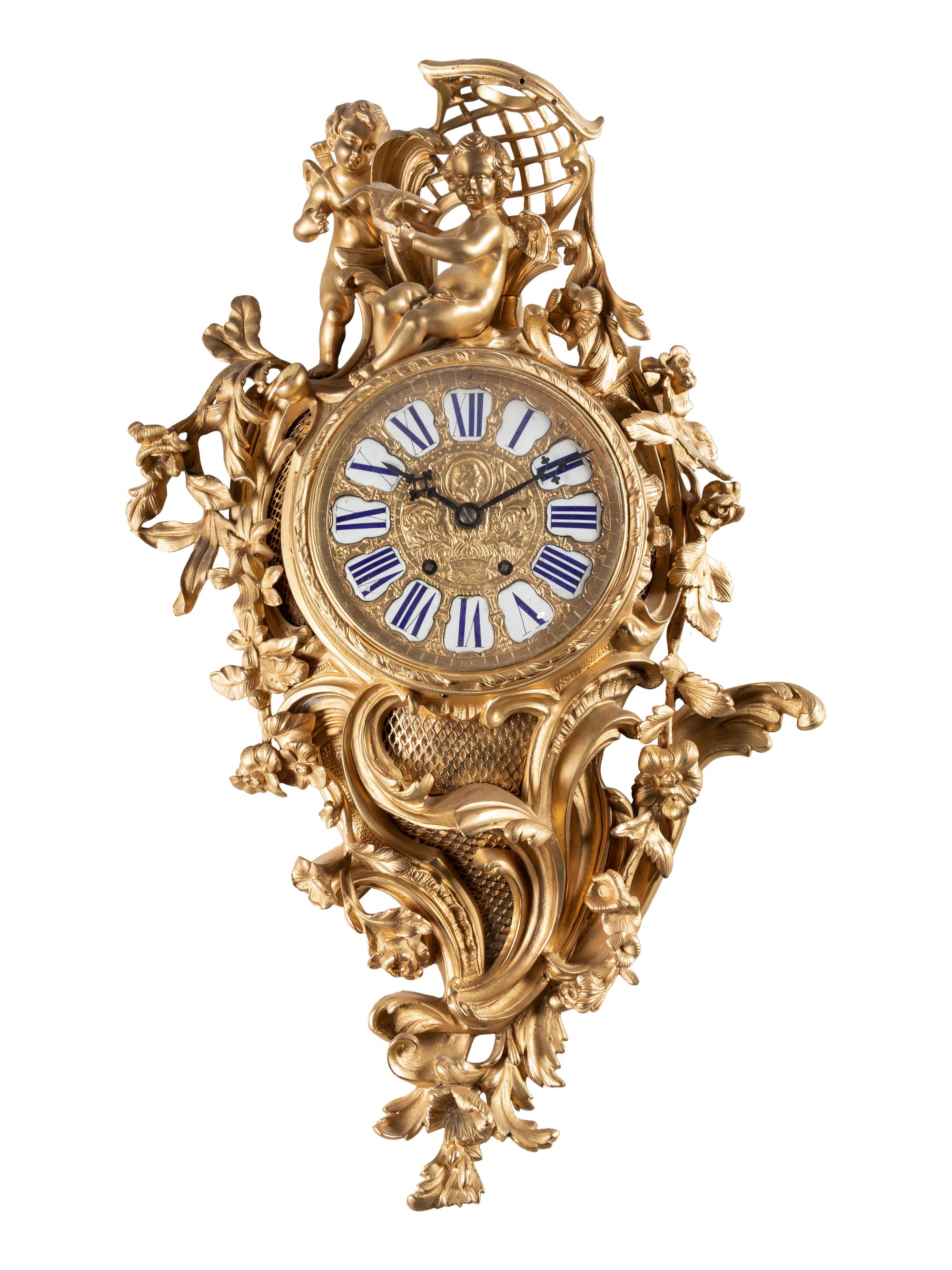 A Louis XV Style Gilt Bronze Cartel Clock