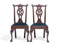A Pair of Chippendale Carved Walnut Side Chairs