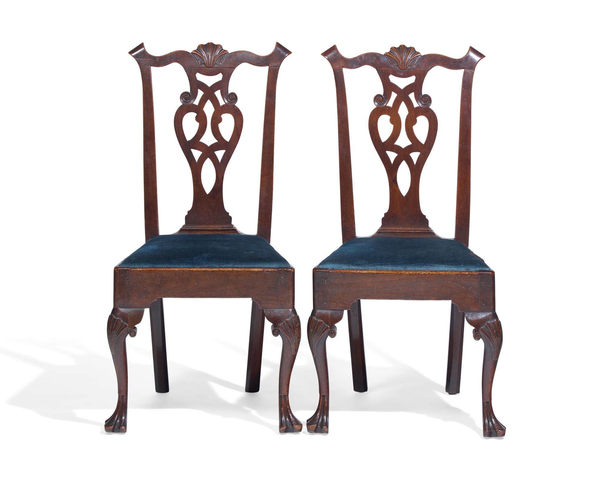 A Pair of Chippendale Carved Walnut Side Chairs