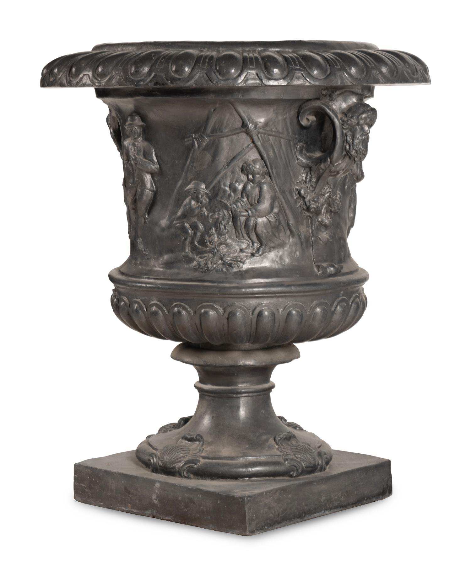 A Pair of English Lead Allegorical Garden Urns