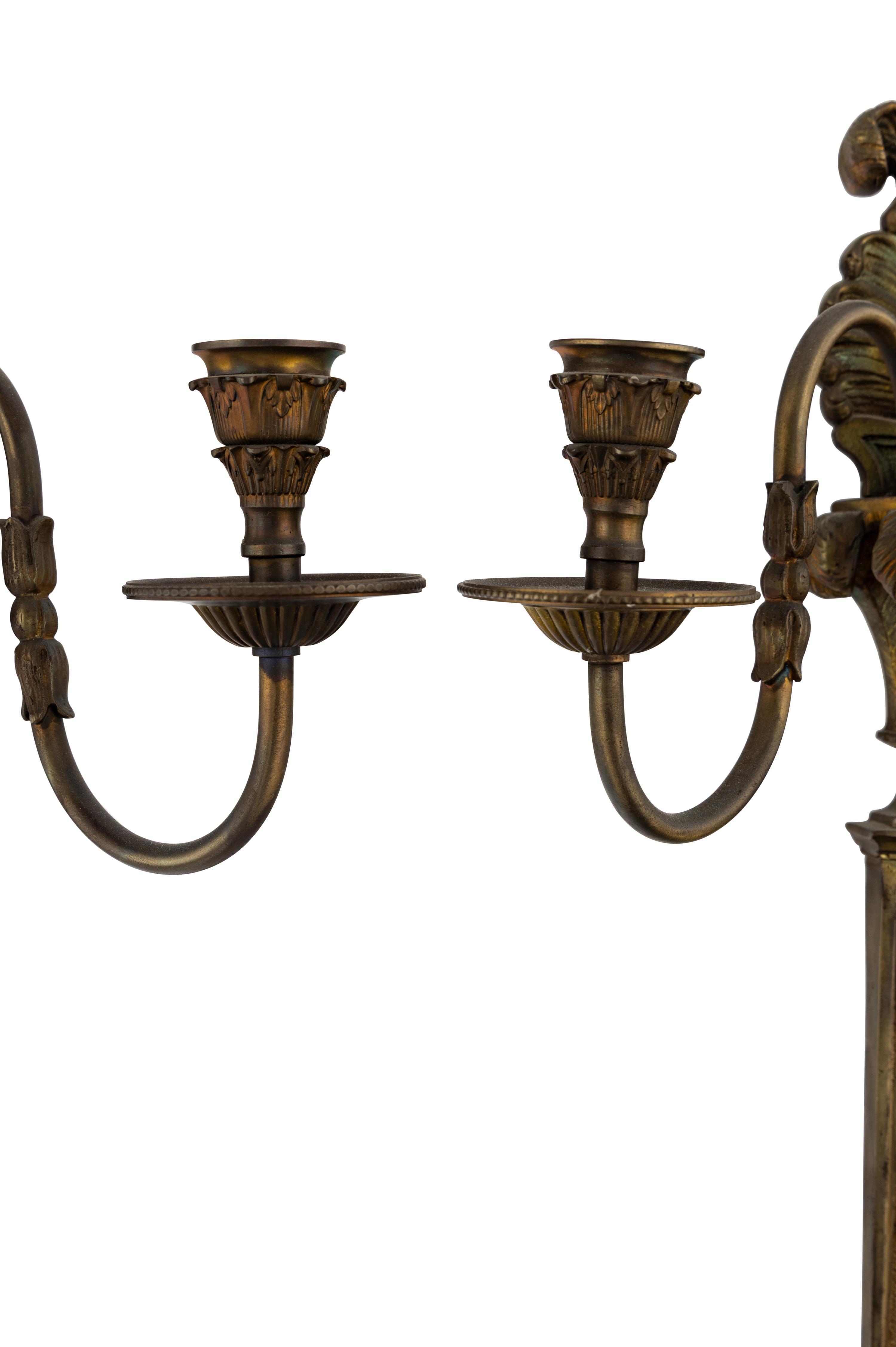 A Pair of Louis XVI Style Bronze Three-Light Sconces