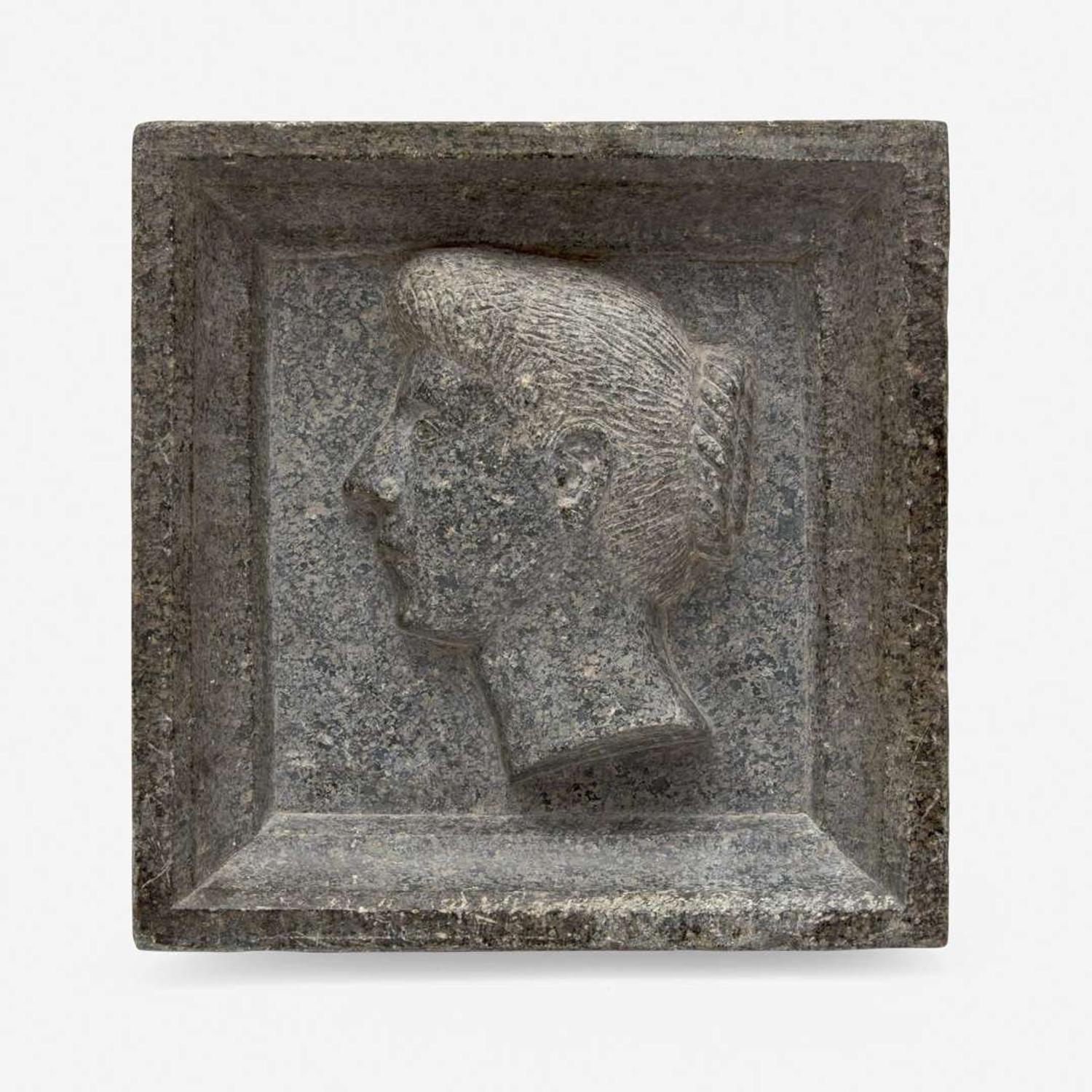 A carved soapstone profile portrait plaque of a lady early 20th century